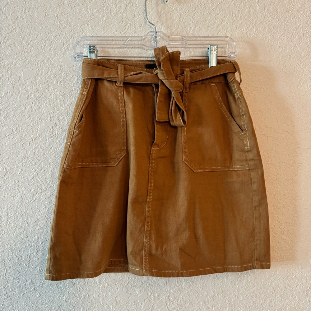 brown denim skirt fits like a medium